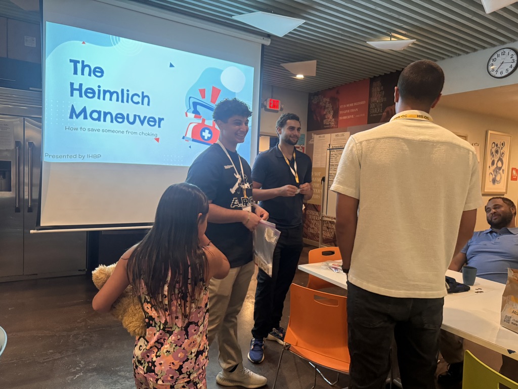 IHBP team presenting the Heimlich maneuver seminar